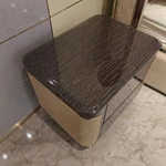 Dark Glossy Nightstand with Woven Leather Side Panels and Hidden Drawer Pulls